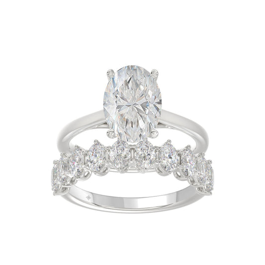14K WHITE GOLD 4 1/2CT ROUND/OVAL DIAMOND LADIES BRIDAL SET (CENTER STONE OVAL DIAMOND 3.00CT)