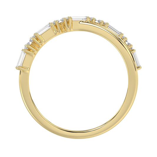Elegant 10K Yellow Gold Ladies Crossover Ring Featuring Alternating Round And Baguette Diamonds 0.20 Ct. A Modern Fine Jewelry Design For Women.