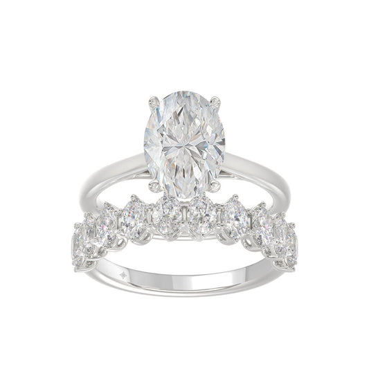 14K WHITE GOLD 4 1/2CT ROUND/OVAL DIAMOND LADIES BRIDAL SET (CENTER STONE OVAL DIAMOND 3.00CT)